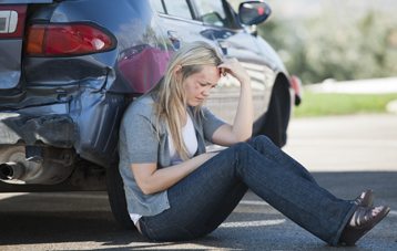 iStock_000017849680Medium (Woman in Car Accident)